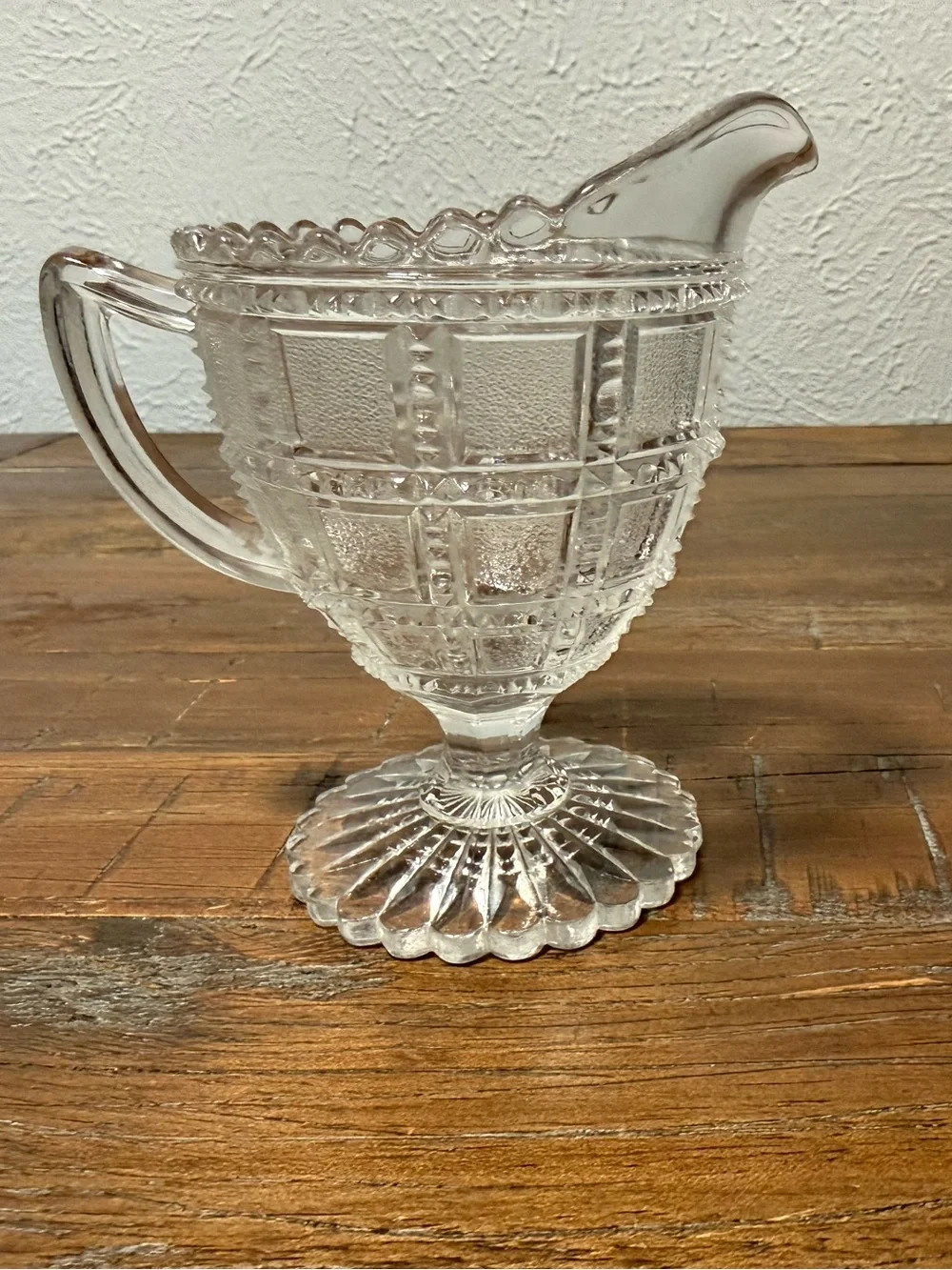 clear glass creamer is an Imperial Glass piece from the 1930s